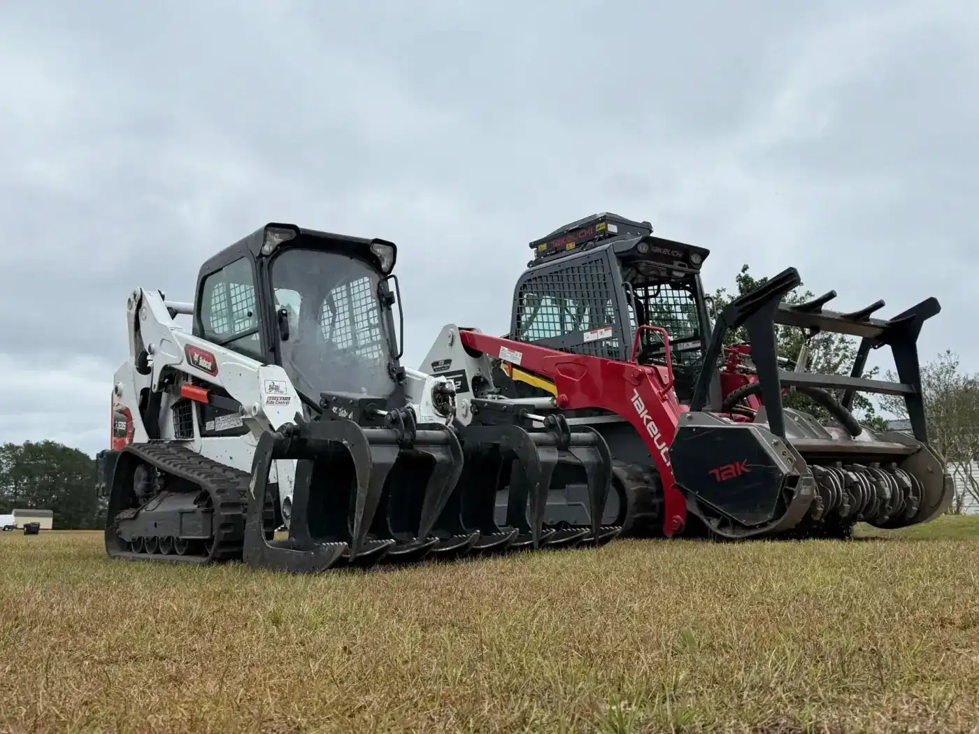 Bobcat and Takeuchi equipment fleet staged for a commercial job