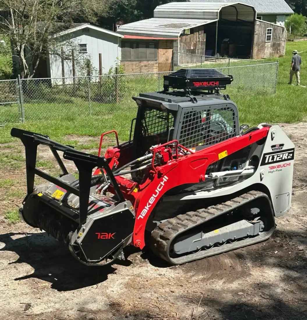 Takeuchi TL12R2 forestry mulcher clearing land in Lenoir County