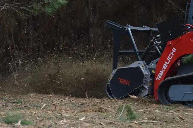Forestry mulching progress on wooded lot